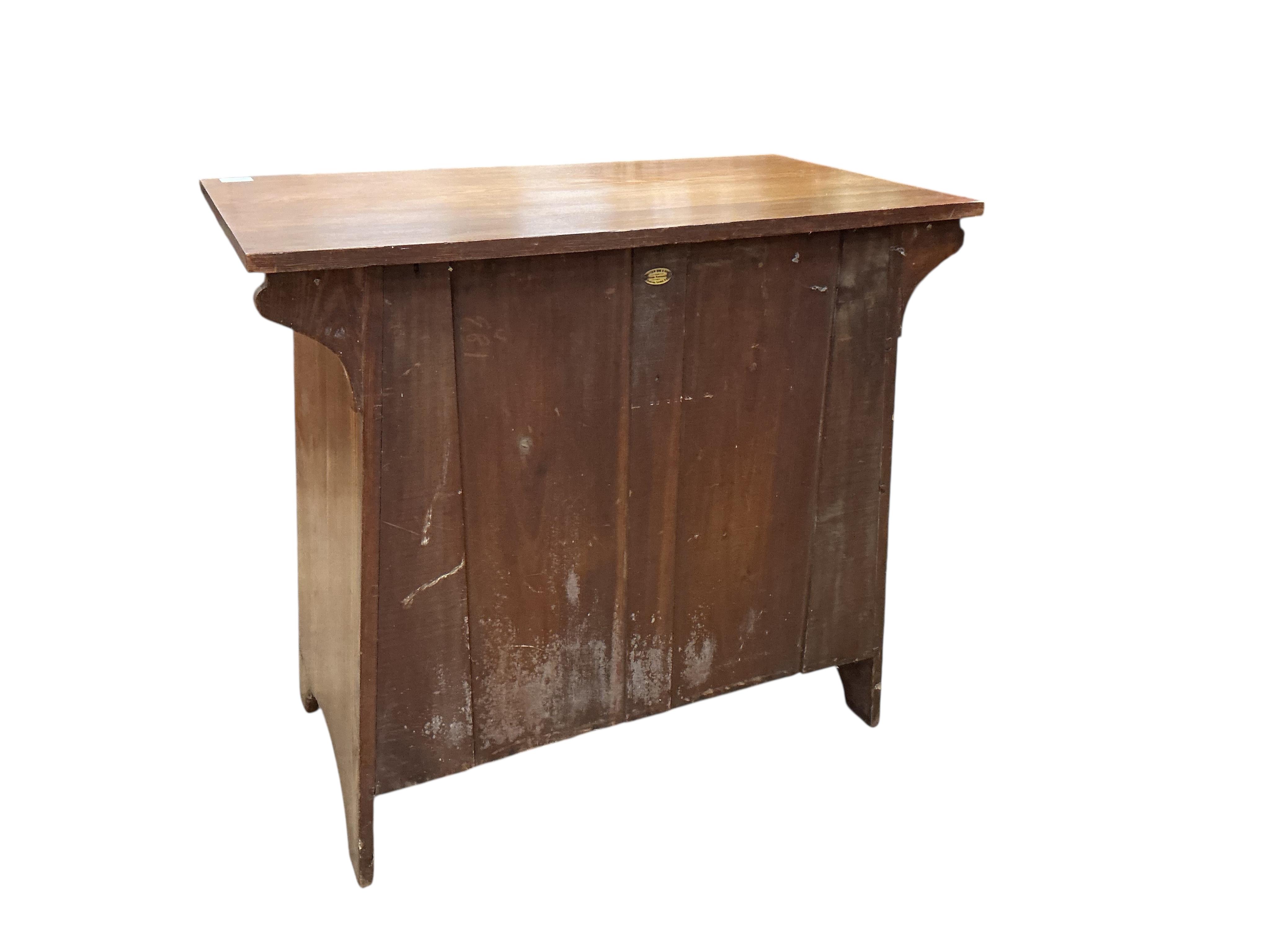 A Liberty style Arts & Crafts oak chest of four drawers, width 91cm, depth 52cm, height 84cm